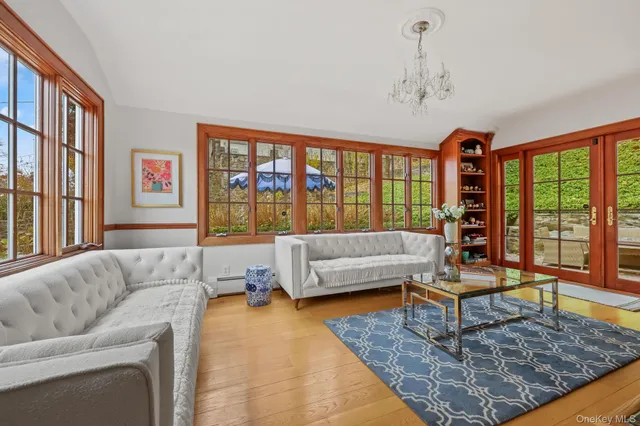 a living room with furniture and a rug