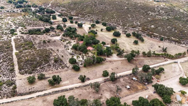 a view of a yard with patio