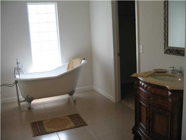 5219 Moore Loop Crestview, FL 32536 - Photo 6 of 14 a room with a chair and a window