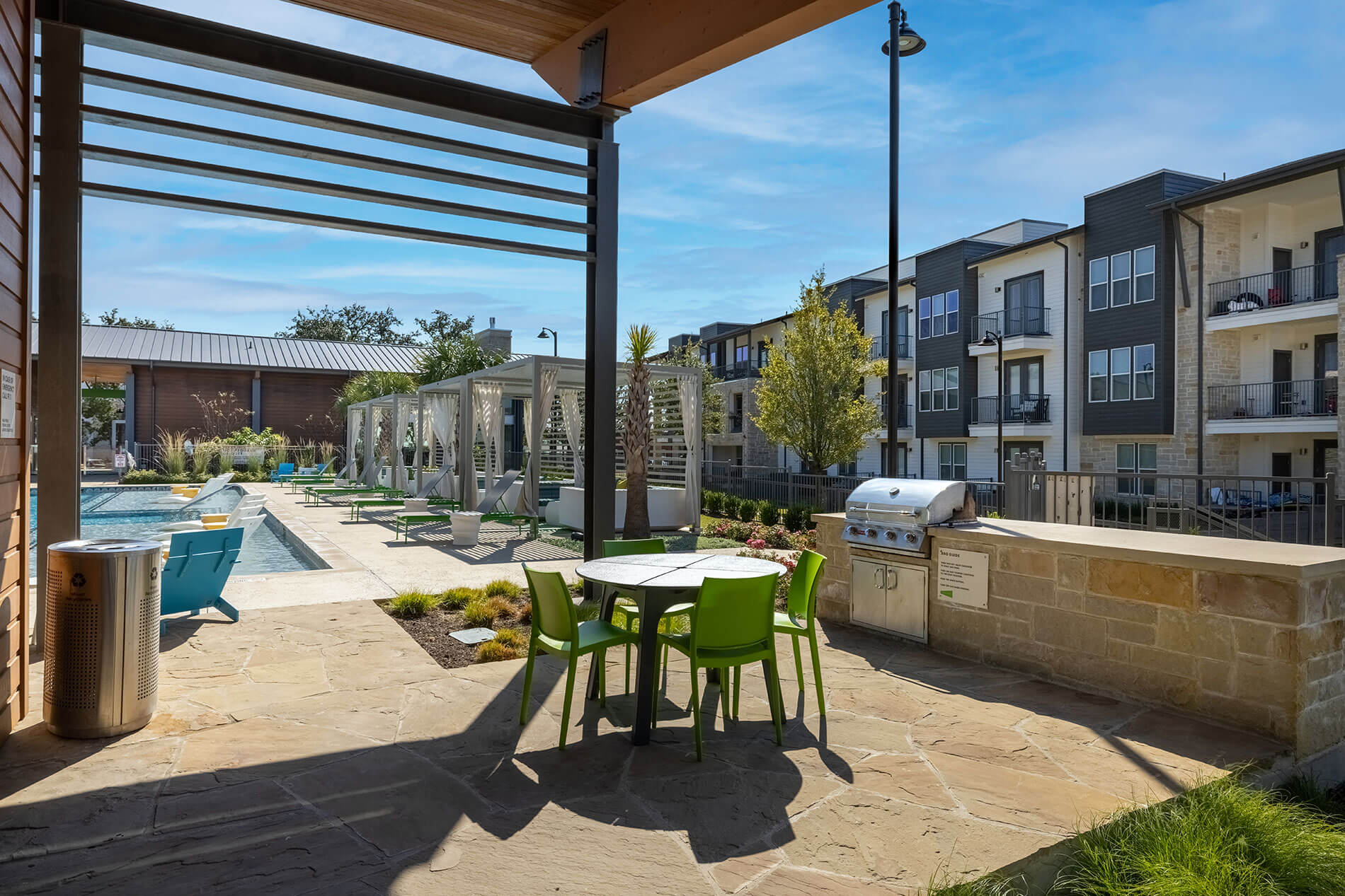 7880 Highway 290, Unit 9208 Austin, TX 78736 - Photo 8 of 9 a outdoor space with lots of chairs and wooden floor