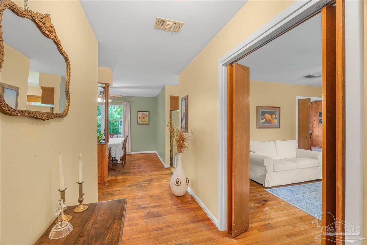 2021 Morningside Drive Pensacola, FL 32503 - Photo 11 of 44 a view of a bedroom from a hallway