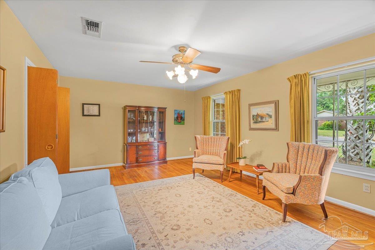 2021 Morningside Drive Pensacola, FL 32503 - Photo 12 of 44 a living room with furniture and wooden floor