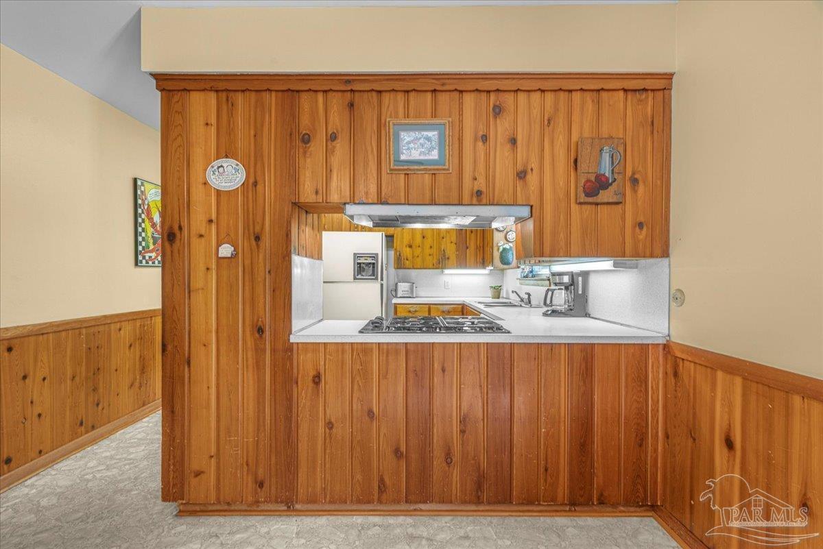 2021 Morningside Drive Pensacola, FL 32503 - Photo 16 of 44 a view of a kitchen with wooden floor
