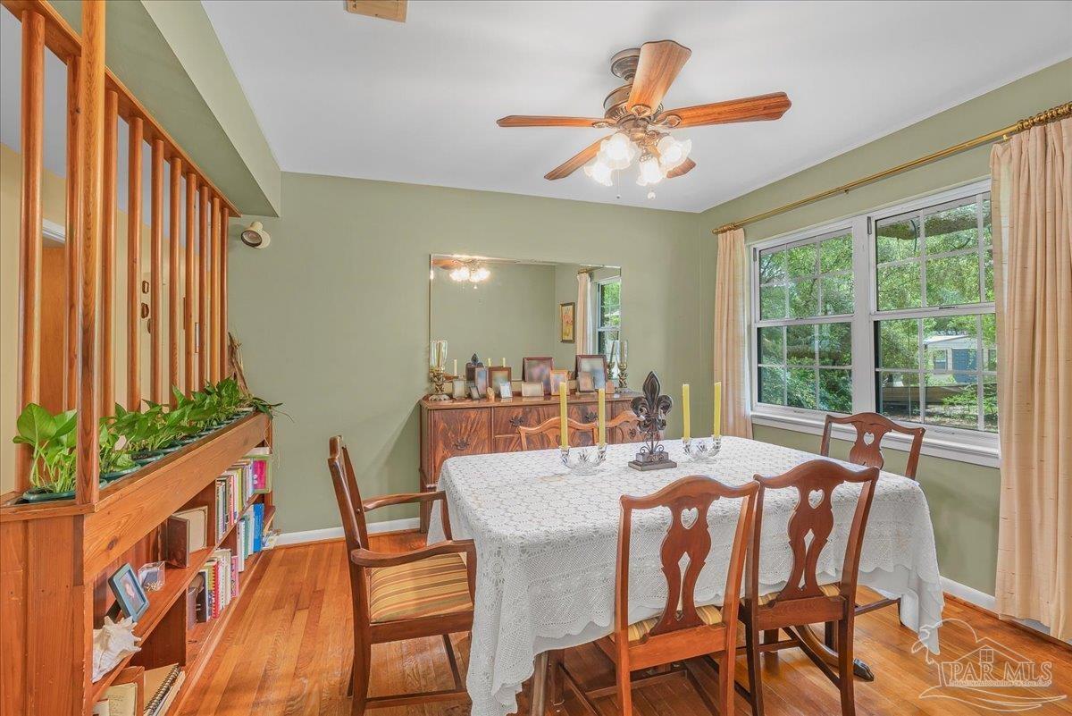 2021 Morningside Drive Pensacola, FL 32503 - Photo 20 of 44 a view of a dining room with furniture window and outside view