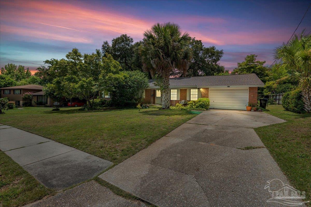 2021 Morningside Drive Pensacola, FL 32503 - Photo 2 of 44 front view of a house with a yard