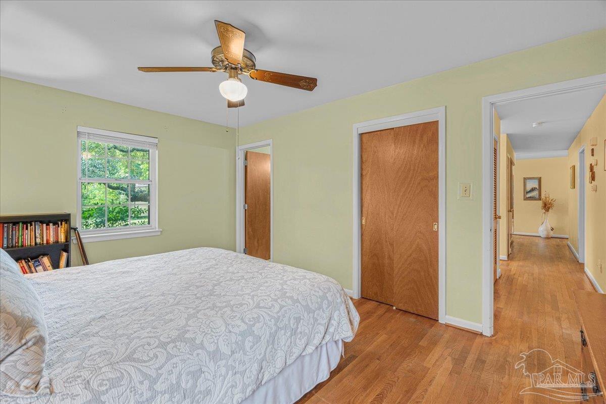2021 Morningside Drive Pensacola, FL 32503 - Photo 24 of 44 a bedroom with a bed and a large window
