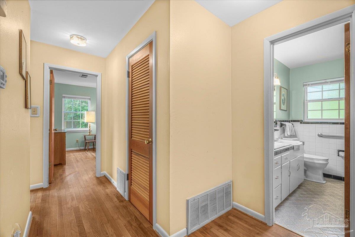2021 Morningside Drive Pensacola, FL 32503 - Photo 29 of 44 a view of a bathroom from a hallway