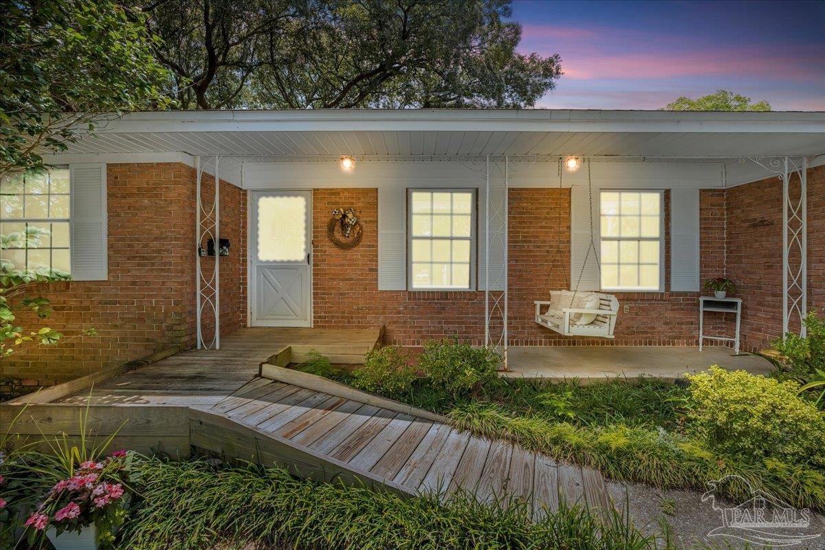 2021 Morningside Drive Pensacola, FL 32503 - Photo 3 of 44 a view of swimming pool with outdoor seating