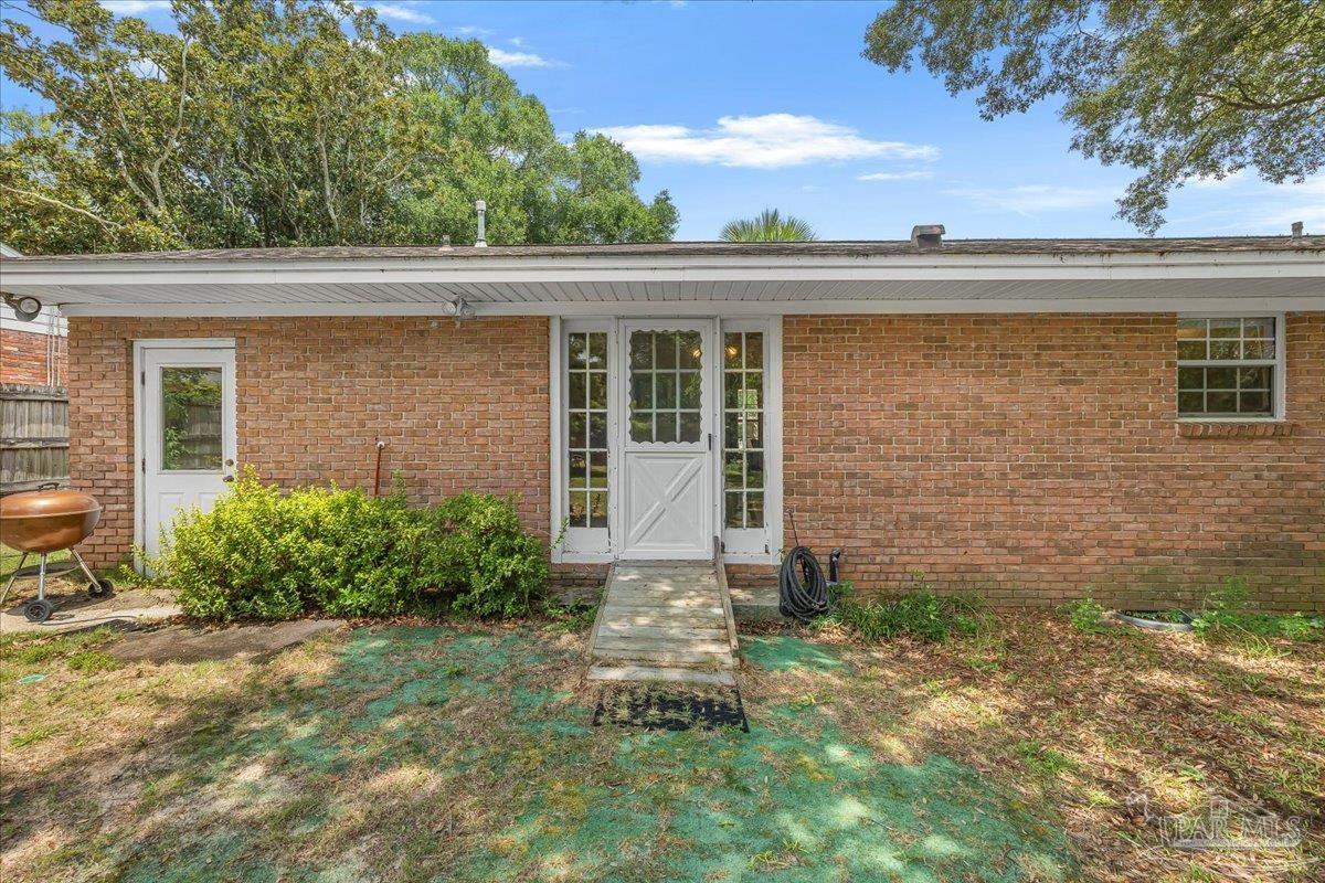 2021 Morningside Drive Pensacola, FL 32503 - Photo 35 of 44 a front view of a house with garden
