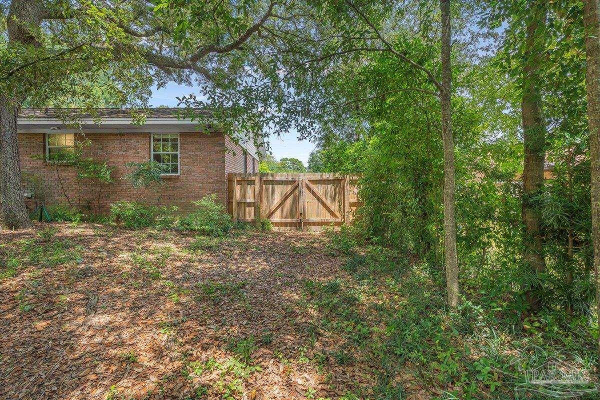 2021 Morningside Drive Pensacola, FL 32503 - Photo 41 of 44 front view of a house with a yard