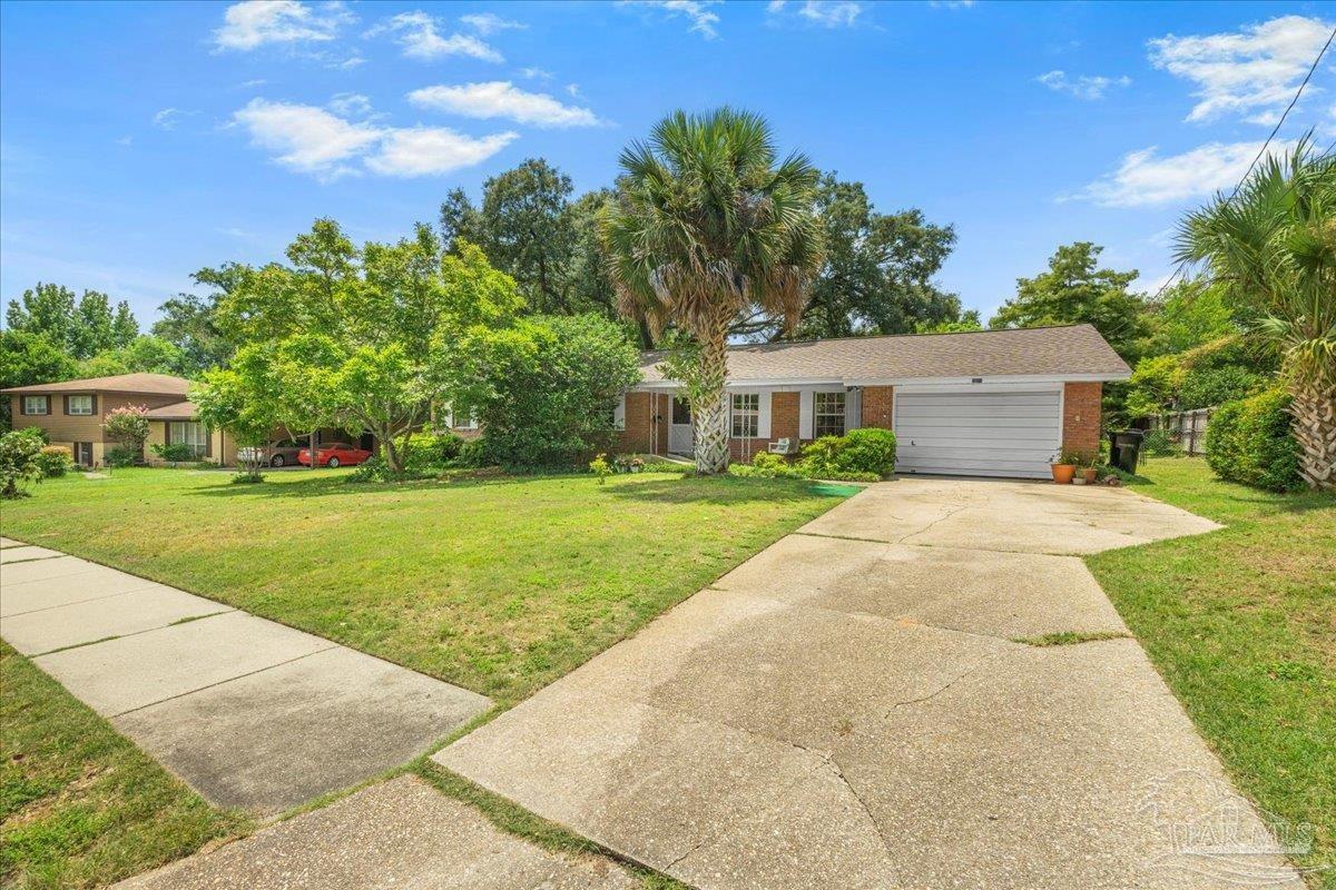 2021 Morningside Drive Pensacola, FL 32503 - Photo 43 of 44 a view of house with a yard