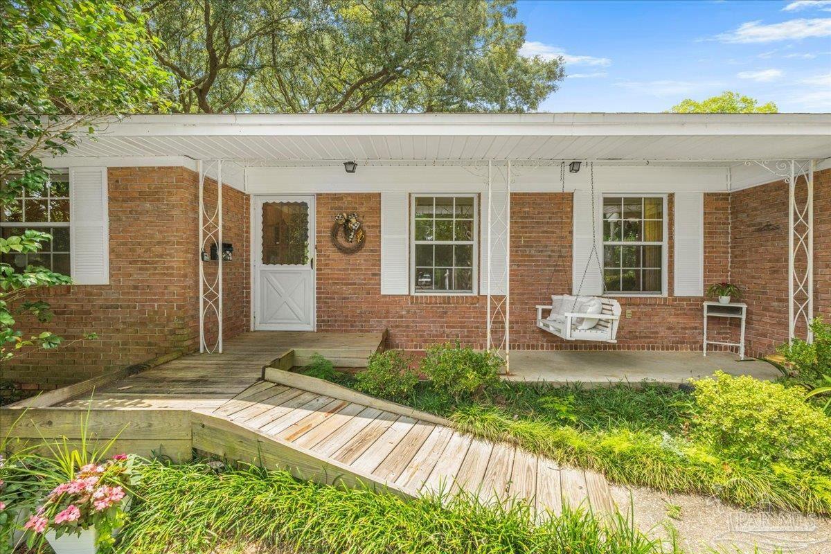 2021 Morningside Drive Pensacola, FL 32503 - Photo 9 of 44 a view of a house with swimming pool and sitting area