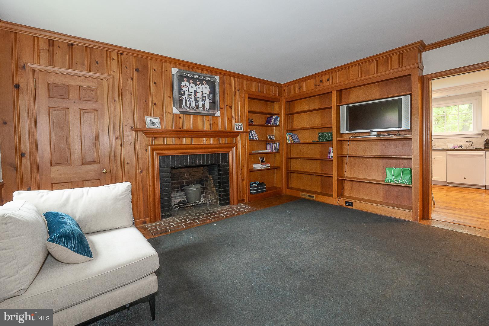 538 Conestoga Road Villanova, PA 19085 - Photo 15 of 39 a living room with furniture and a fireplace