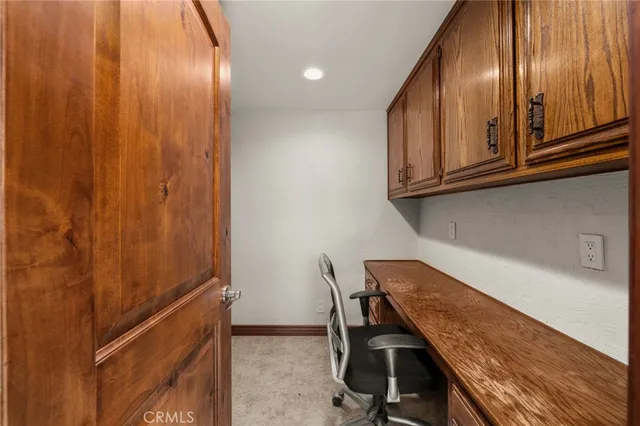 a view of a livingroom with furniture and window