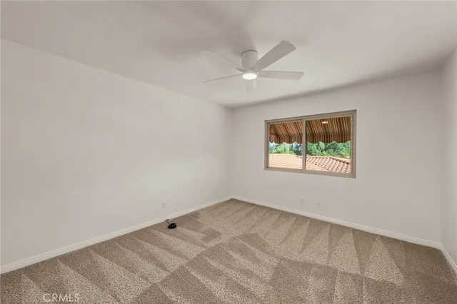 an aerial view of residential houses and outdoor space