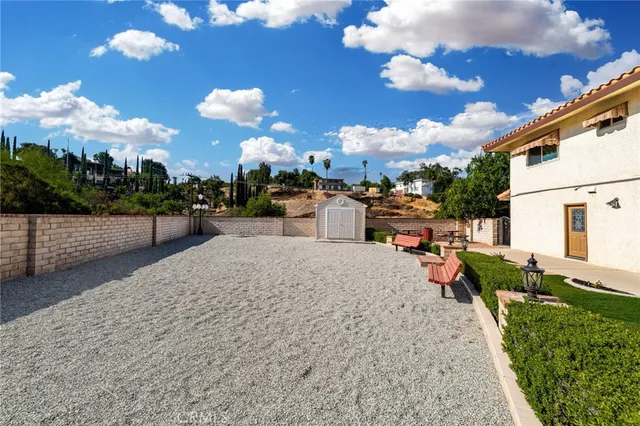 a picture of a room with a bench and a cabinets