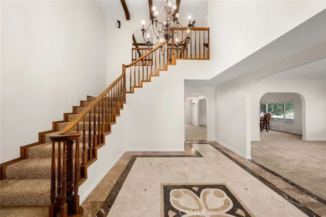 a view of a livingroom with furniture and a fireplace
