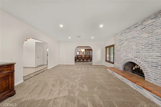 a kitchen with granite countertop a stove and a sink