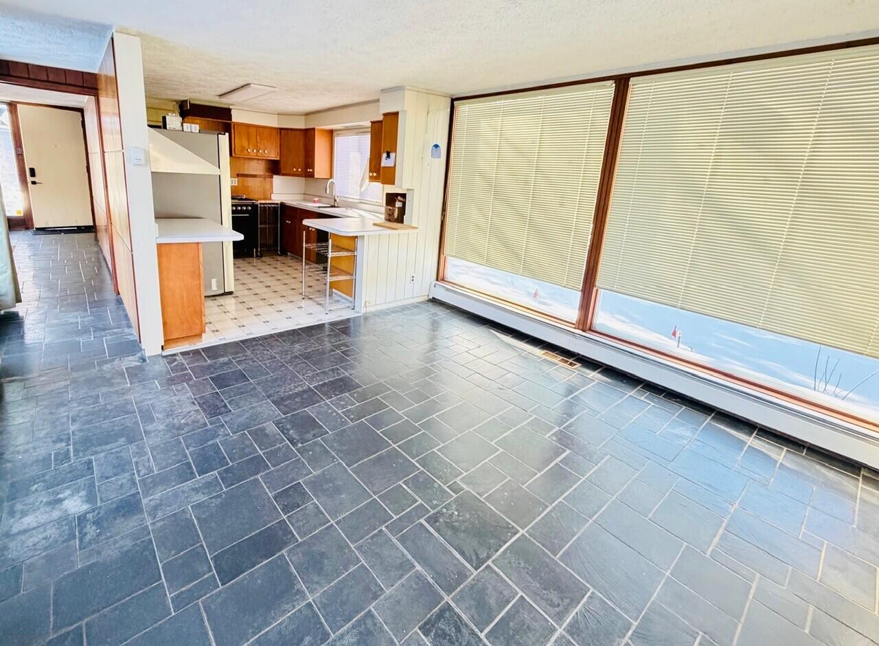 2401 Maple Street Michigan City, IN 46360 - Photo 3 of 12 a view of living room with furniture and window