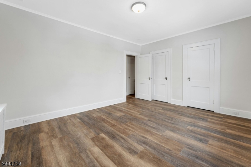 5 Gates Avenue Summit, NJ 07901 - Photo 12 of 24 a view of an empty room and wooden floor