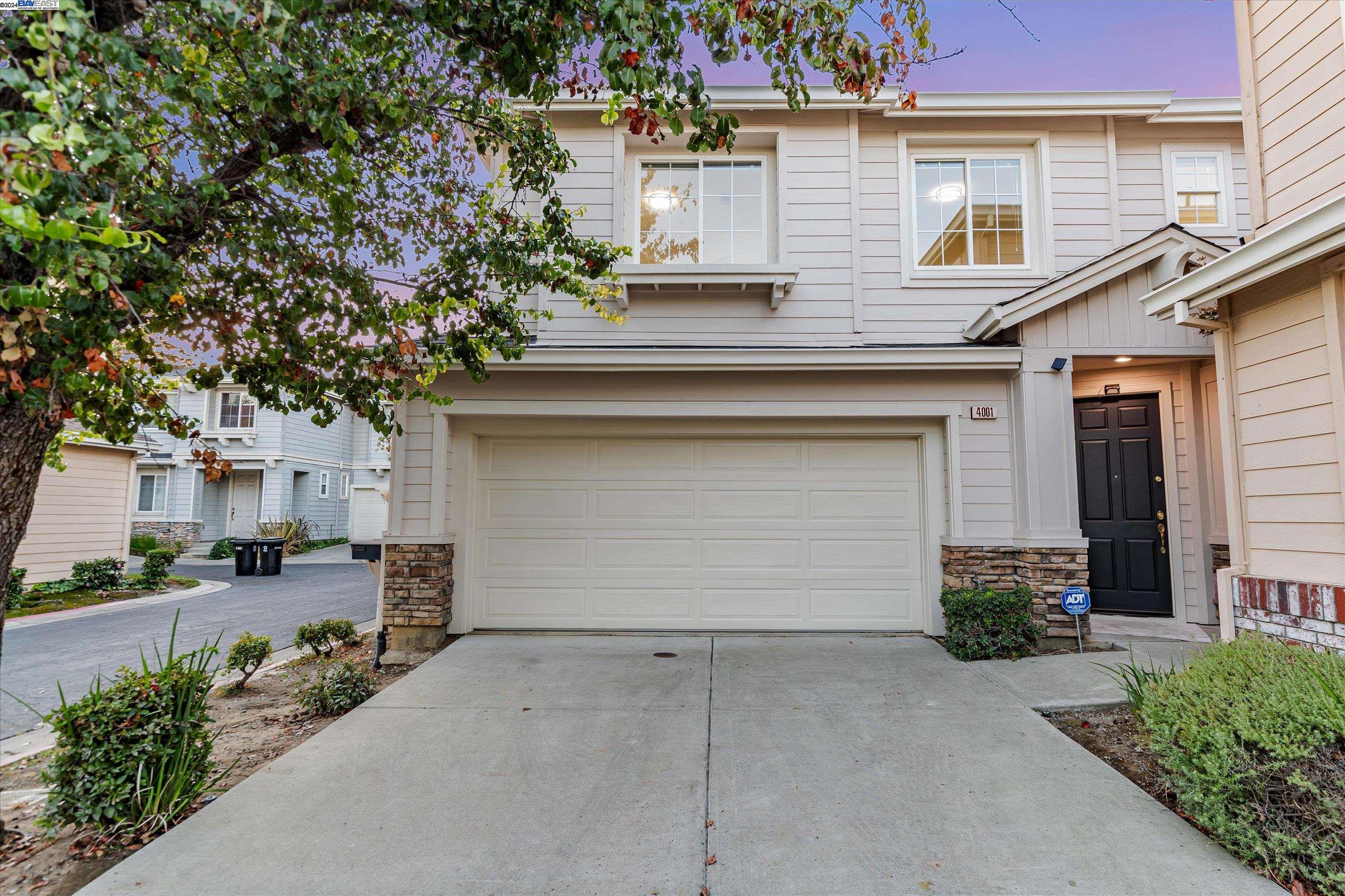 a small white building with a outdoor space