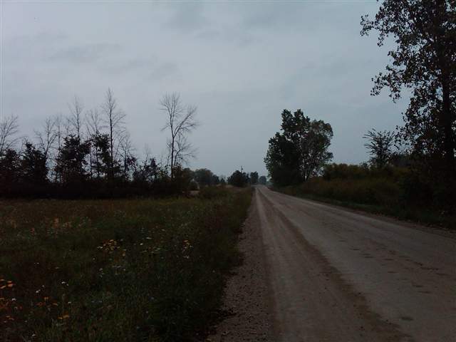 This is view 6 of the property from the road.