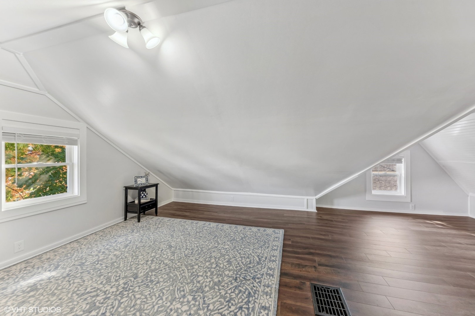 1952 Kearney Avenue Racine, WI 53403 - Photo 22 of 31 a view of empty room with wooden floor and fan