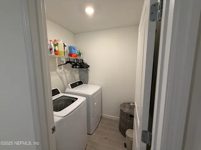 a view of a bedroom from a hallway