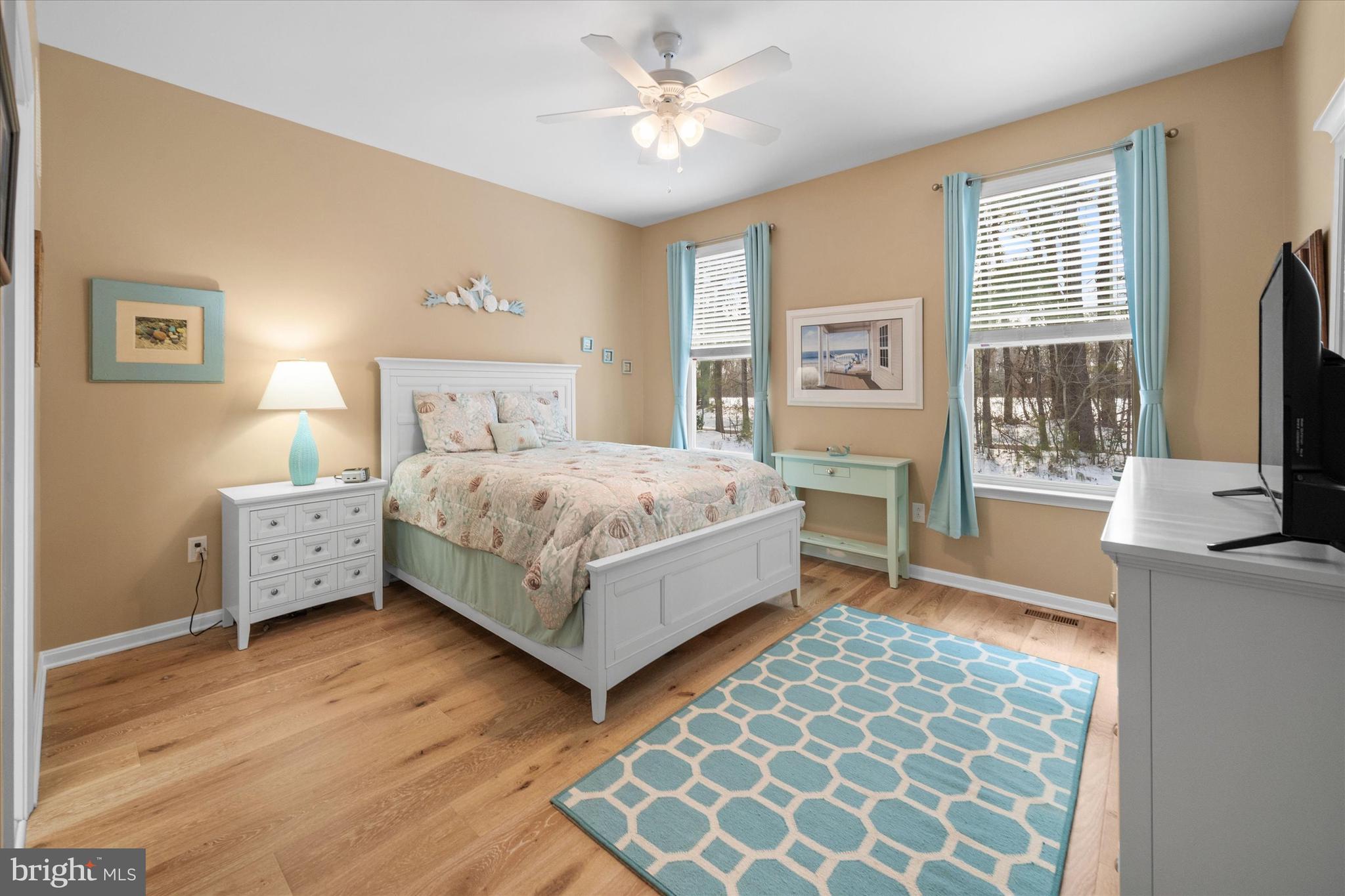 34497 Spring Brook Avenue Lewes, DE 19958 - Photo 12 of 39 Primary suite with hardwood flooring