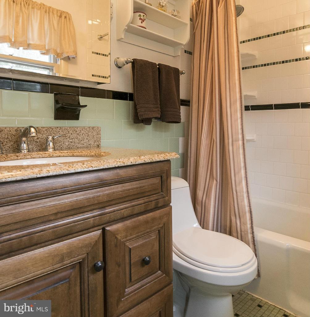 615 Horncrest Road Towson, MD 21204 - Photo 11 of 22 Master bath with tub/shower combination