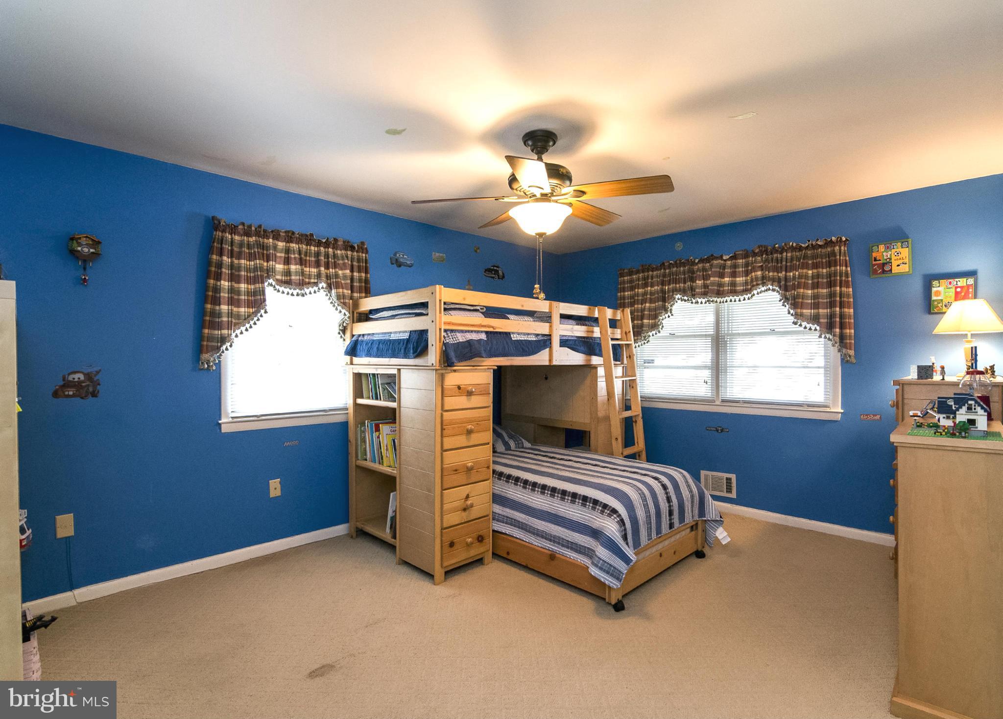 615 Horncrest Road Towson, MD 21204 - Photo 12 of 22 2nd bedroom with carpet over hardwood