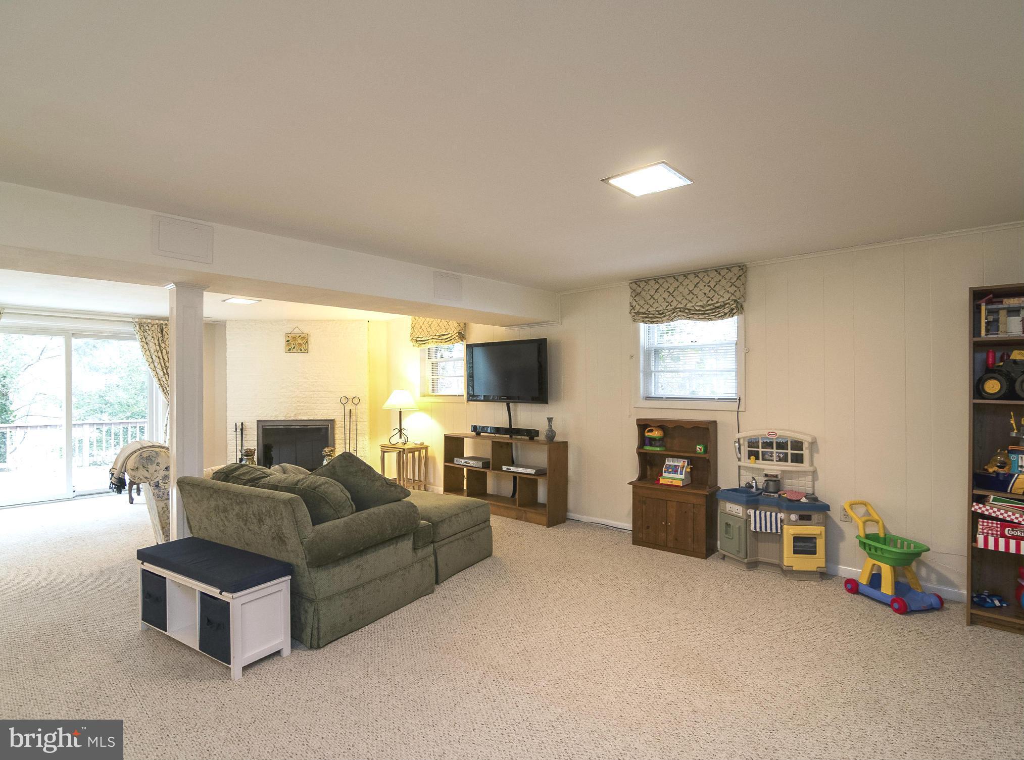 615 Horncrest Road Towson, MD 21204 - Photo 16 of 22 Family Room with sliding door to patio