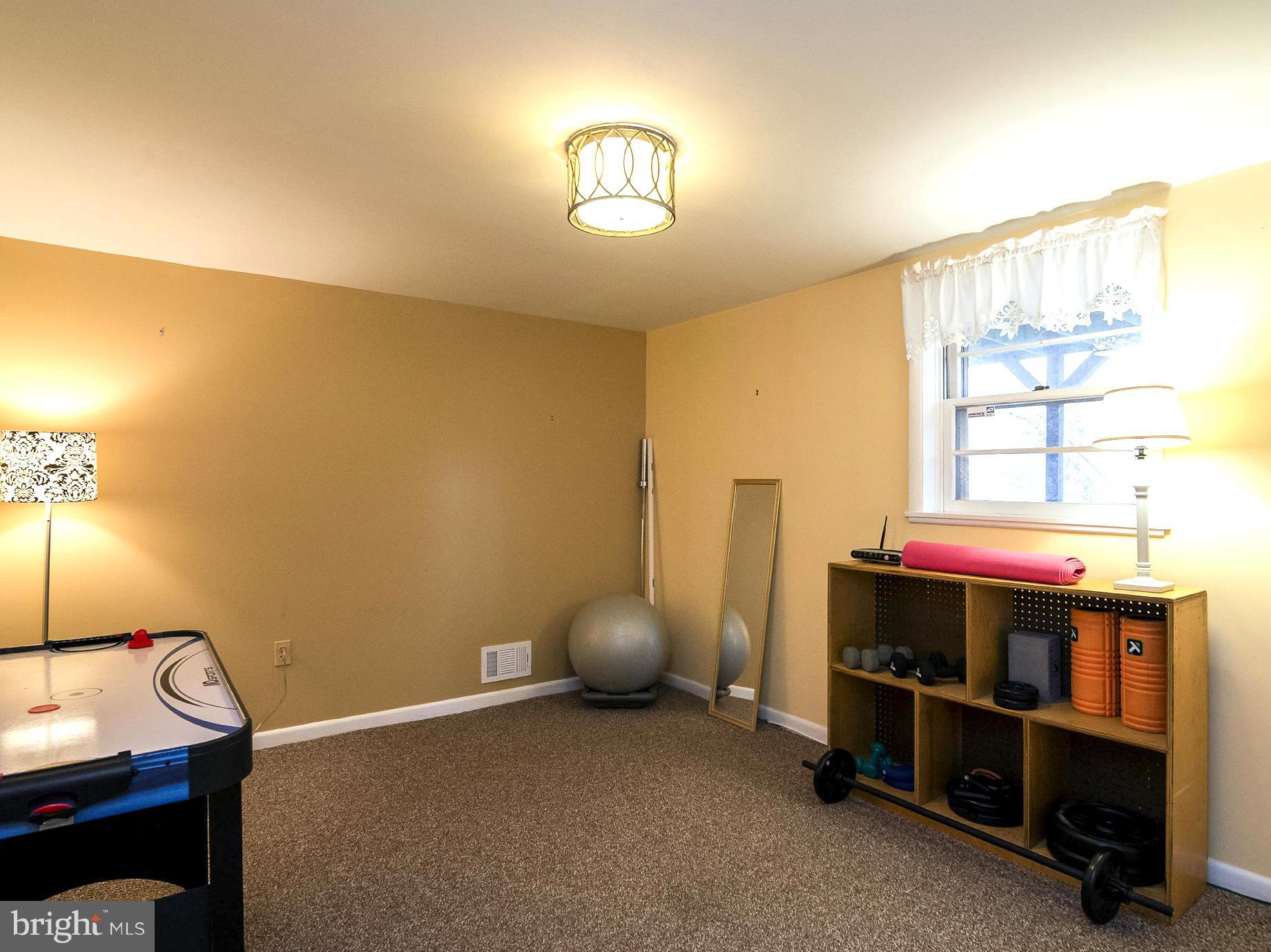 615 Horncrest Road Towson, MD 21204 - Photo 17 of 22 4th Bedroom currently used as exercise/game room