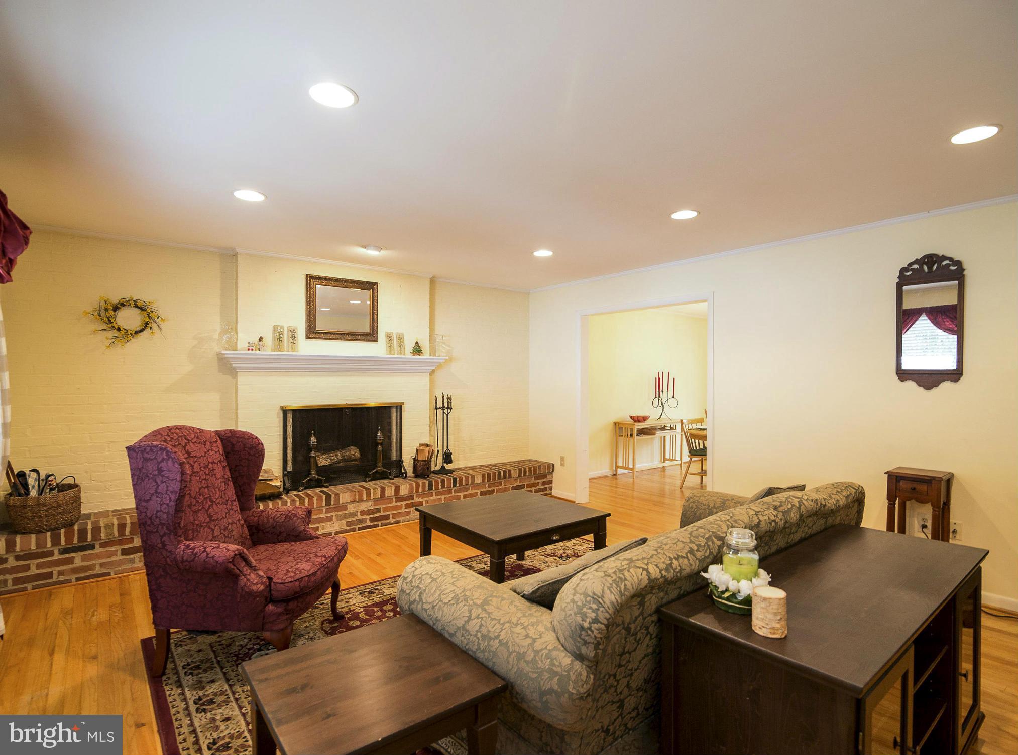 615 Horncrest Road Towson, MD 21204 - Photo 3 of 22 Living Room with wood burning fireplace