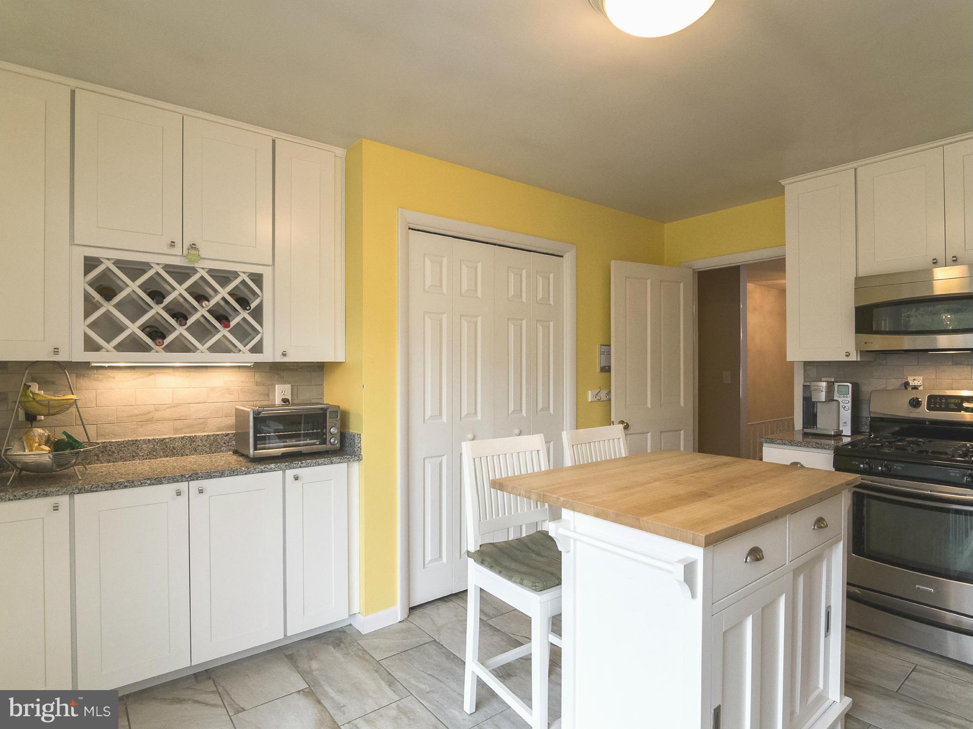 615 Horncrest Road Towson, MD 21204 - Photo 8 of 22 Kitchen with wine rack & large pantry