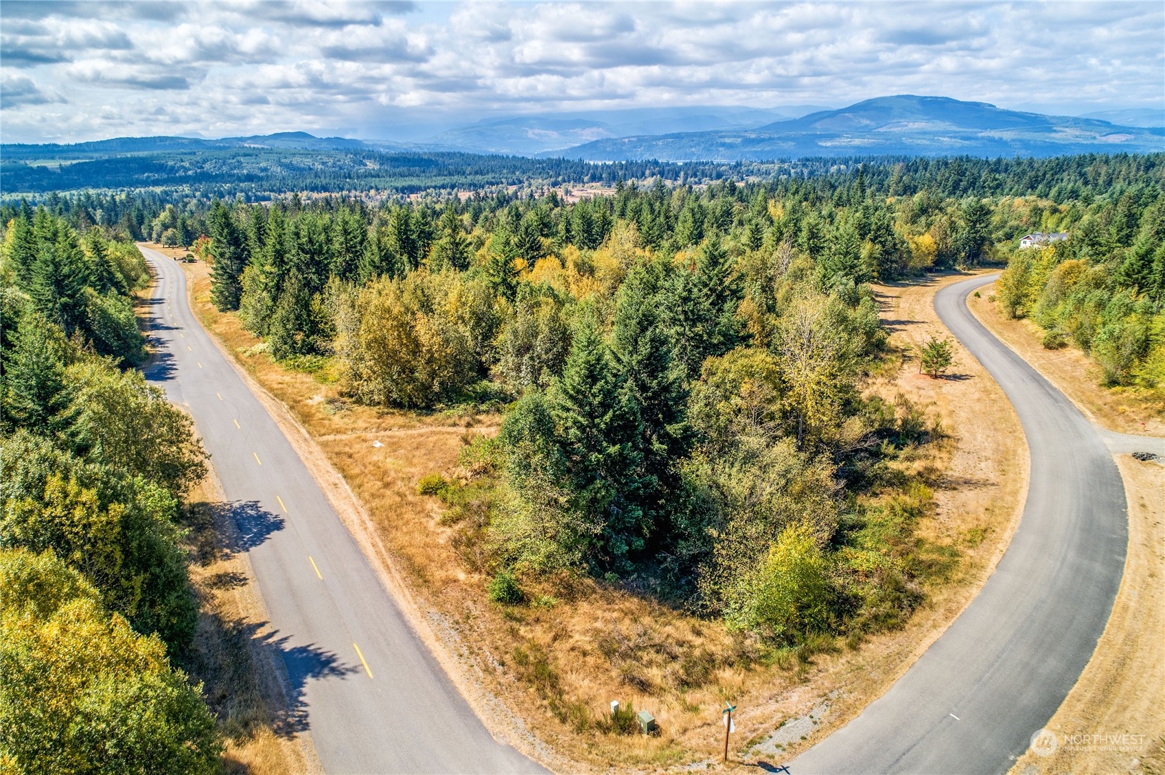 45 Quail Ridge Court Port Townsend, WA 98368 - Photo 1 of 18 a view of a swimming pool with a outdoor seating