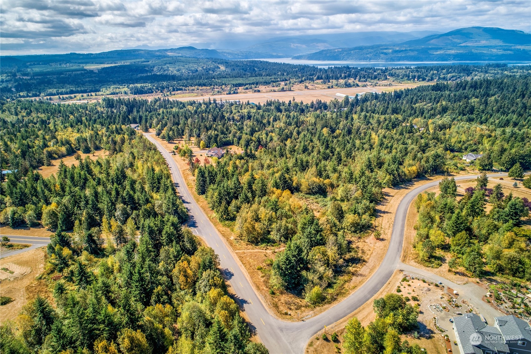 45 Quail Ridge Court Port Townsend, WA 98368 - Photo 5 of 18 a view of a lake with a mountain
