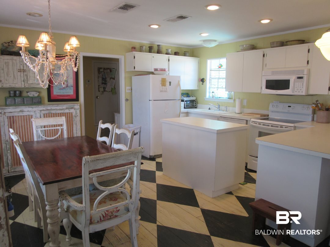 574 Our Road Gulf Shores, AL 36542 - Photo 8 of 32 Dining to Kitchen