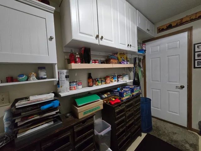 a outdoor space with lots of furniture and clutter