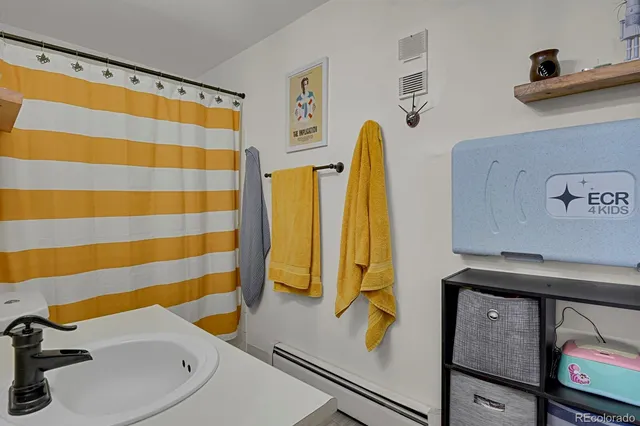 a utility room with closet dryer and washer