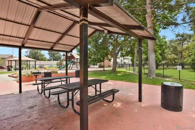 a view of a backyard with a garden and plants