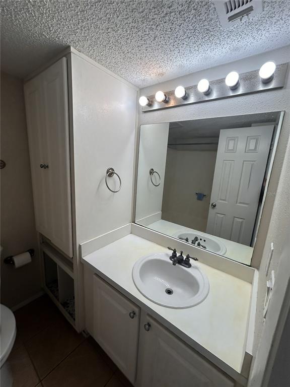 Undisclosed Address Altamonte Springs, FL 32701 - Photo 8 of 11 a bathroom with a sink vanity and a mirror
