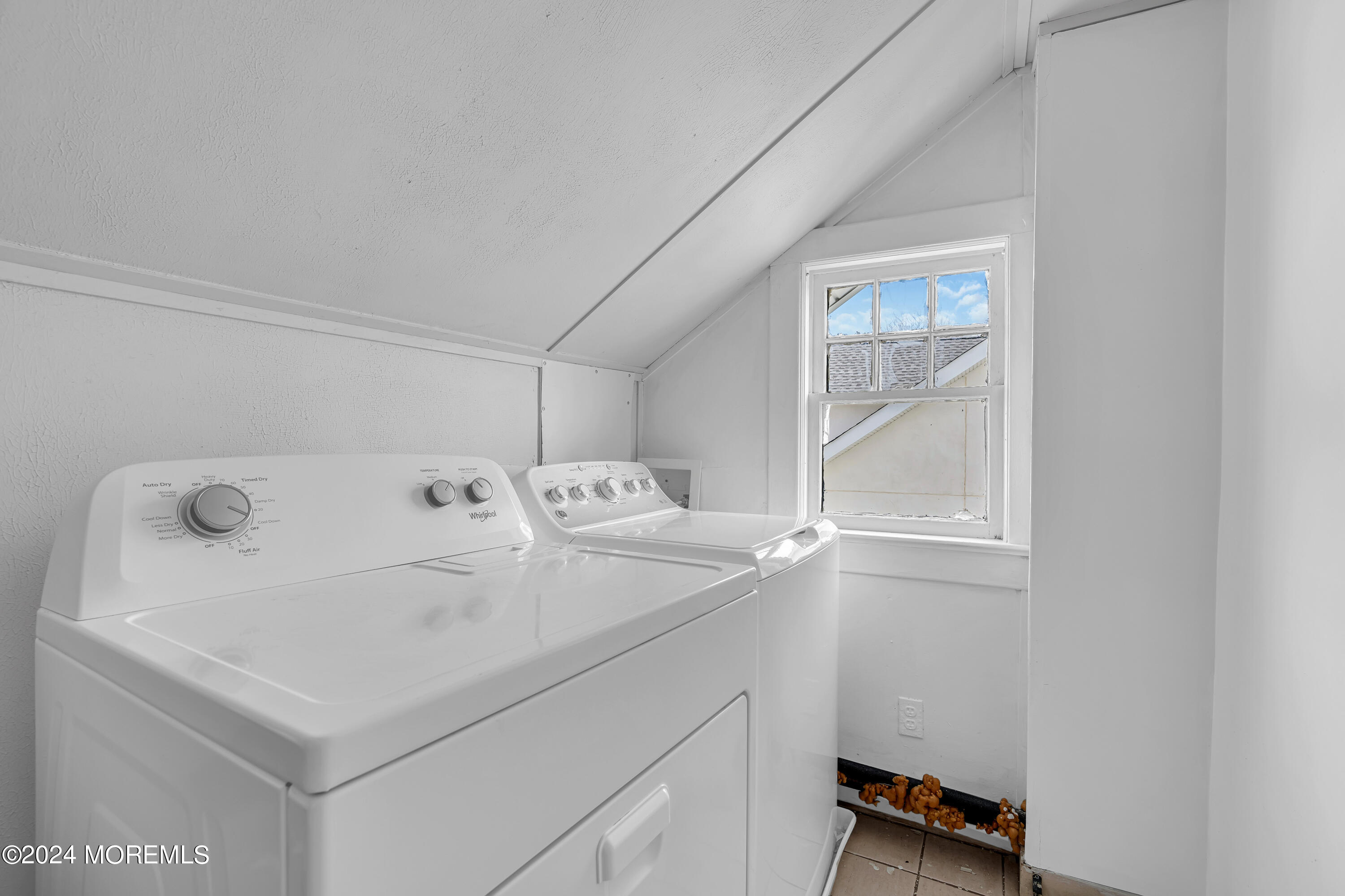 17 Lakeview Road Deal, NJ 07723 - Photo 24 of 30 a utility room with dryer and washer