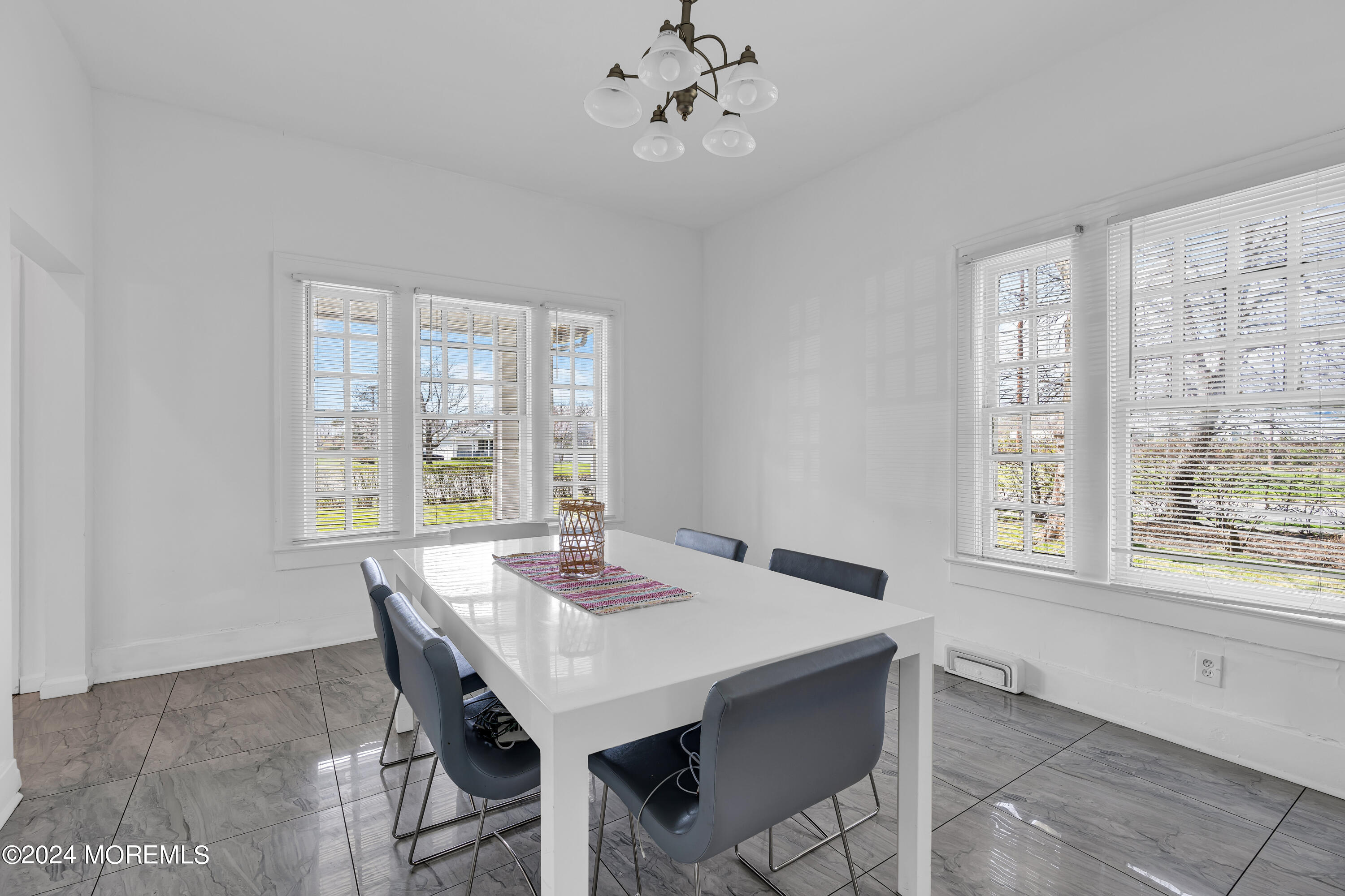 17 Lakeview Road Deal, NJ 07723 - Photo 5 of 30 a view of a dining room with furniture window and outside view