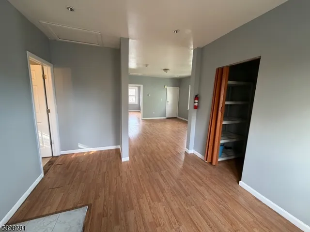 a view of livingroom with furniture and wooden floor