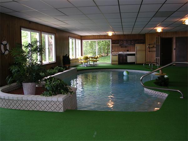 61 Haverhill Road Amesbury, MA 01913 - Photo 1 of 16 a view of a swimming pool with a yard