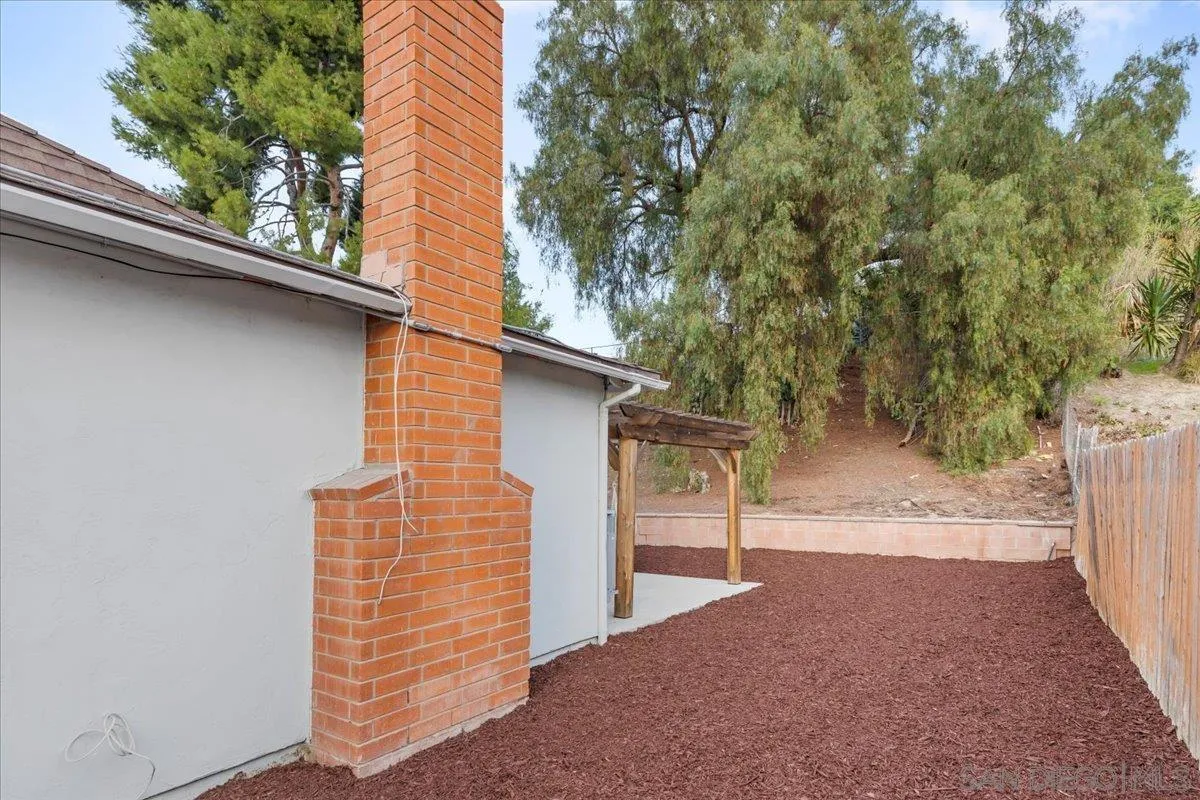 9737 Roe Drive Santee, CA 92071 - Photo 33 of 37 a view of a house with a tree
