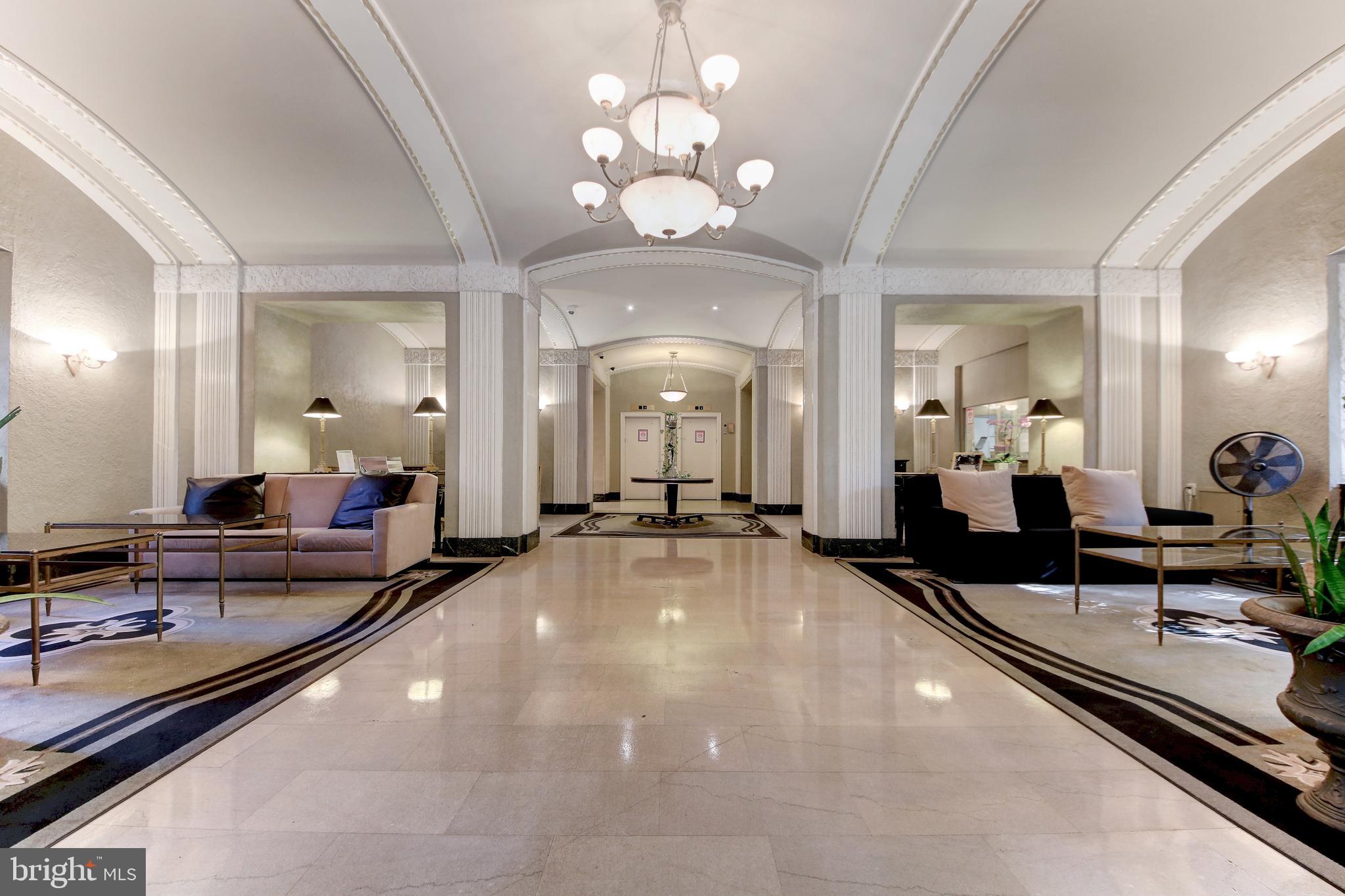 2032 Belmont Road Northwest, Unit 334 Washington, DC 20009 - Photo 15 of 35 Lobby with front desk and common area