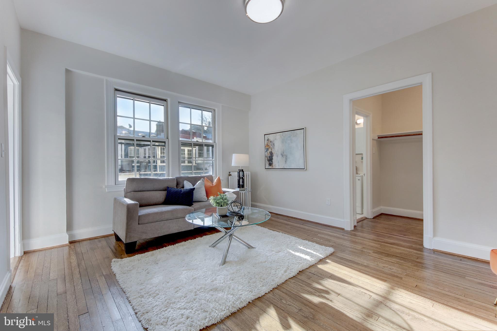 2032 Belmont Road Northwest, Unit 334 Washington, DC 20009 - Photo 3 of 35 This living space is great for entertaining!