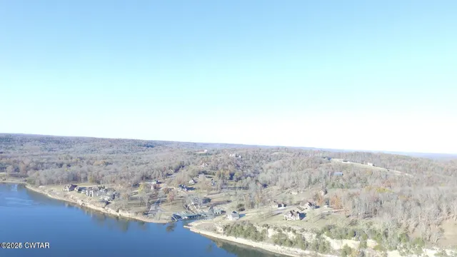 a view of a dry space with mountain